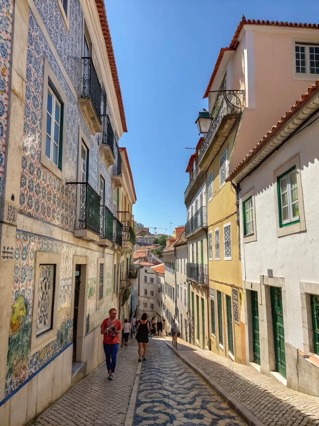 A picturesque view of Lisbon, Portugal, with its historic architecture and coastal charm, representing RT Global Capital's extensive experience in the Portuguese market.
